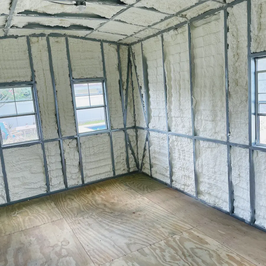 Closed-cell spray foam insulation applied to wall cavities in a residential project in Moberly